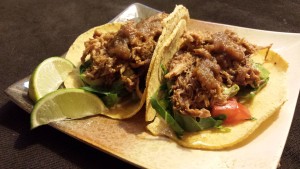 Tacos carnitas with fresh shredded collard greens